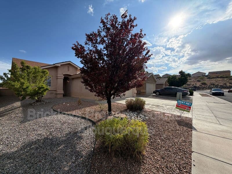 3-bedroom 2-bath home at 7704 Woodstar Ave NW for $1,825/mo managed by Brickleys Property Solutions Albuquerque — photo 3 of 28