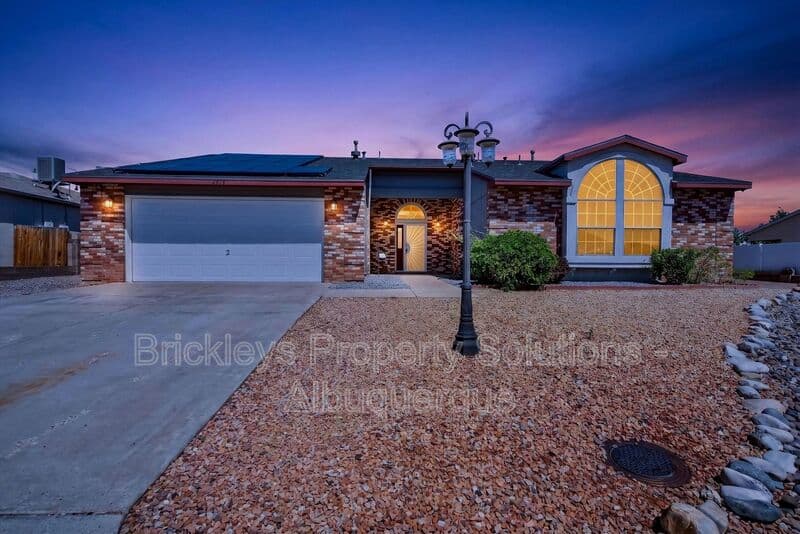 4-bedroom 2-bath home at 2413 Agua Fria Dr NE for $2,275/mo managed by Brickleys Property Solutions Albuquerque — photo 1 of 42