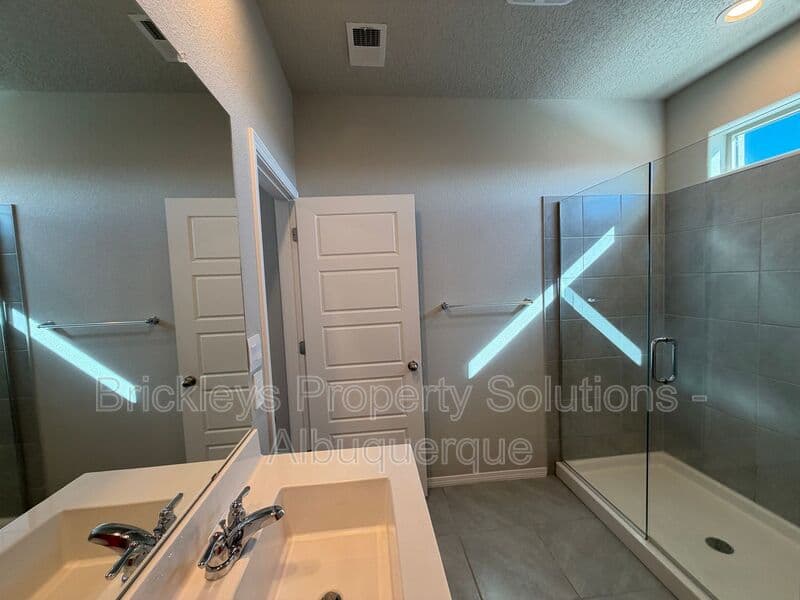 3-bedroom 2-bath home at 614 Turmalina Dr SE for $2,200/mo managed by Brickleys Property Solutions Albuquerque — photo 17 of 29