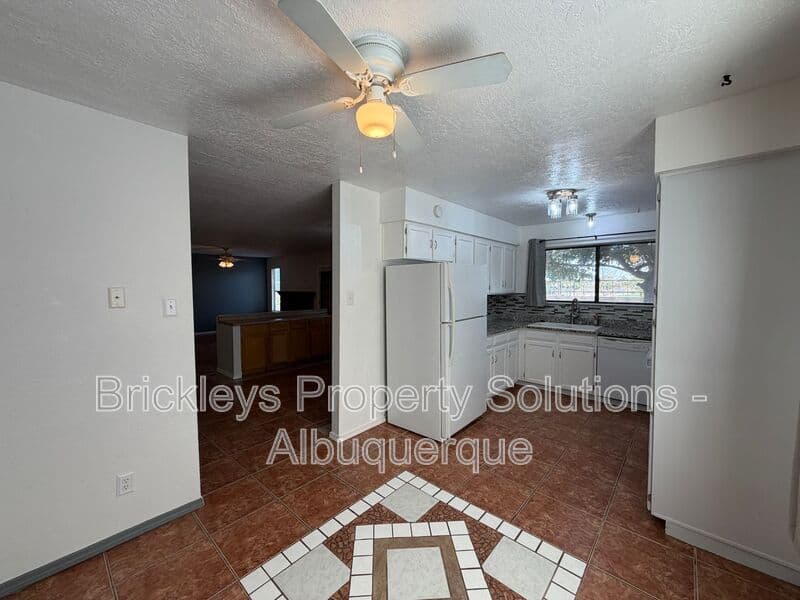 4-bedroom 2-bath home at 5812 Brahma Dr NW for $1,950/mo managed by Brickleys Property Solutions Albuquerque — photo 27 of 35