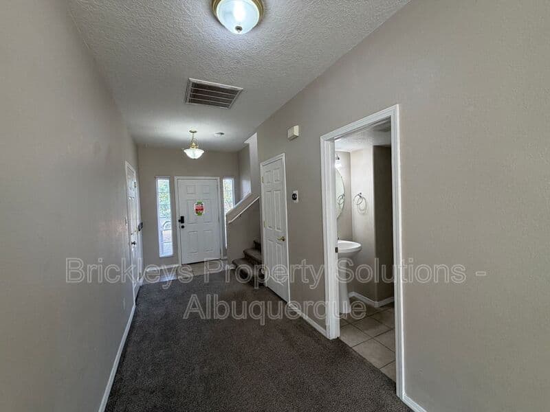 5-bedroom 4.5-bath home at 7008 Tree Line Ave NW for $2,500/mo managed by Brickleys Property Solutions Albuquerque — photo 26 of 43
