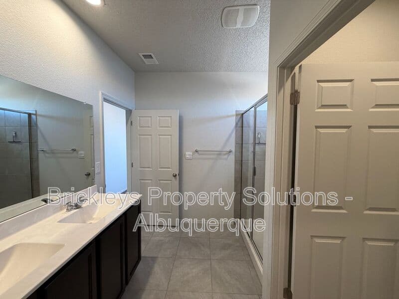 3-bedroom 2-bath home at 1504 Alto Colores for $2,100/mo managed by Brickleys Property Solutions Albuquerque — photo 17 of 30