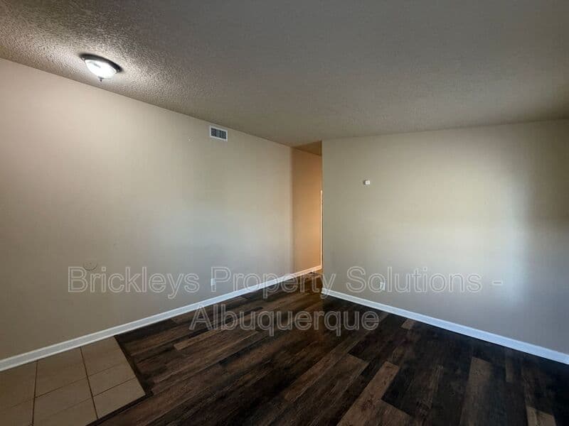 3-bedroom 2-bath home at 1548 Reynosa Loop SE for $1,900/mo managed by Brickleys Property Solutions Albuquerque — photo 5 of 31