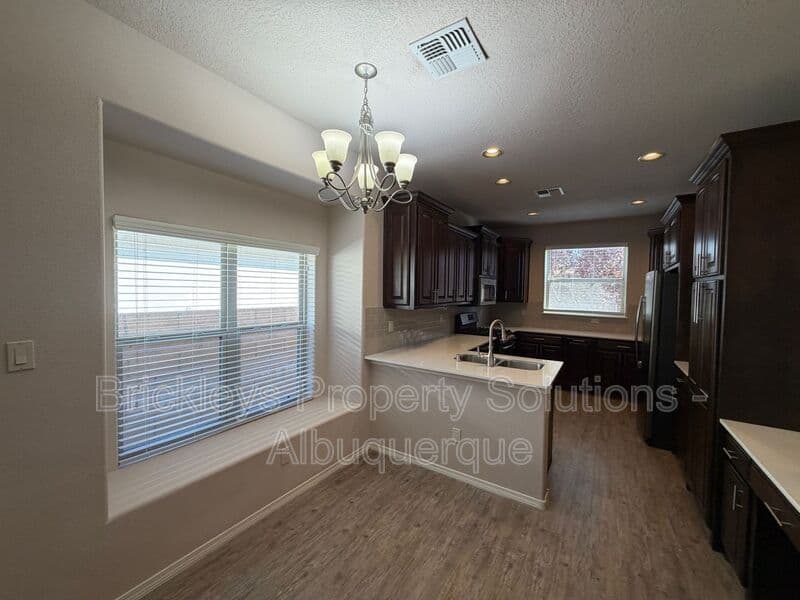3-bedroom 2-bath home at 5815 Mafraq Ave NW for $2,150/mo managed by Brickleys Property Solutions Albuquerque — photo 8 of 32