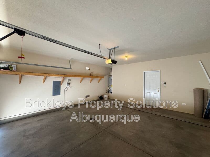 4-bedroom 3-bath home at 7131 Wild Olive Ave NE for $2,900/mo managed by Brickleys Property Solutions Albuquerque — photo 34 of 38