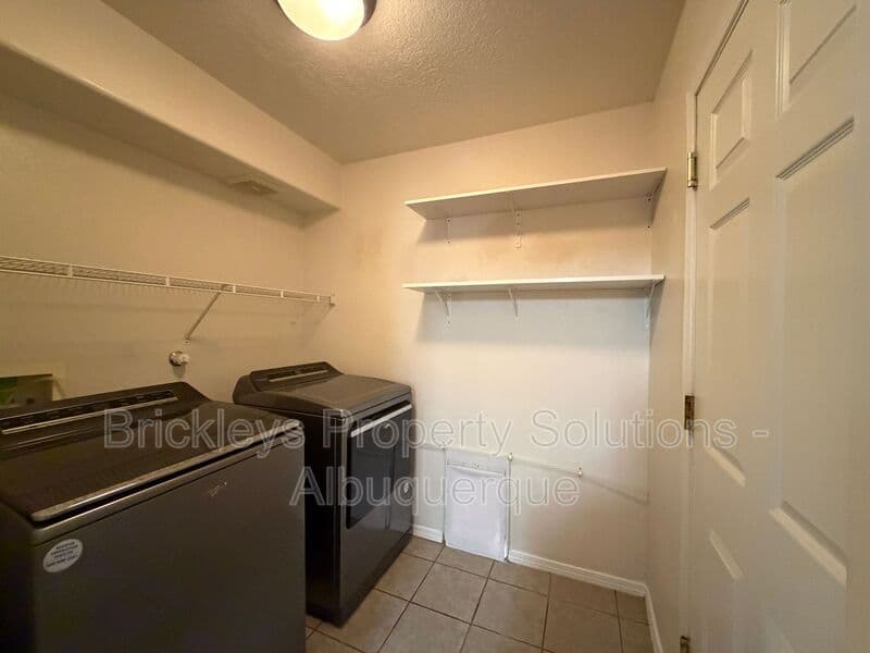 3-bedroom 3-bath home at 5004 Blue Stone Rd NW for $2,250/mo managed by Brickleys Property Solutions Albuquerque — photo 35 of 37