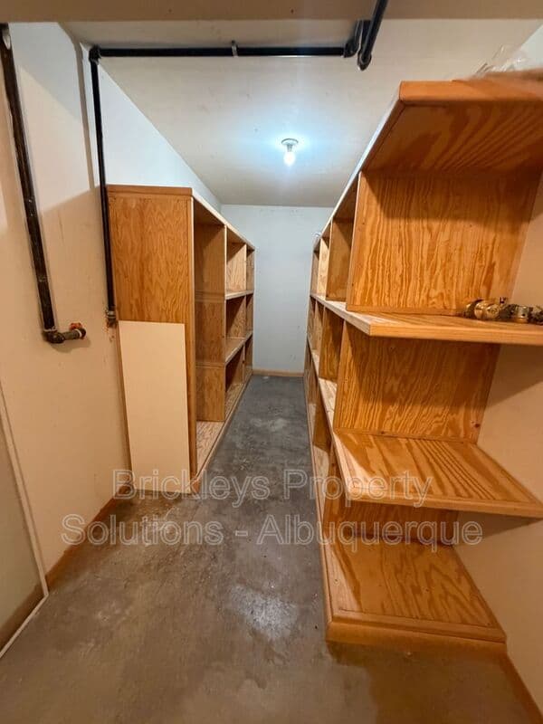 4-bedroom 3-bath home at 7121 Edwina Ave NE for $2,450/mo managed by Brickleys Property Solutions Albuquerque — photo 41 of 47