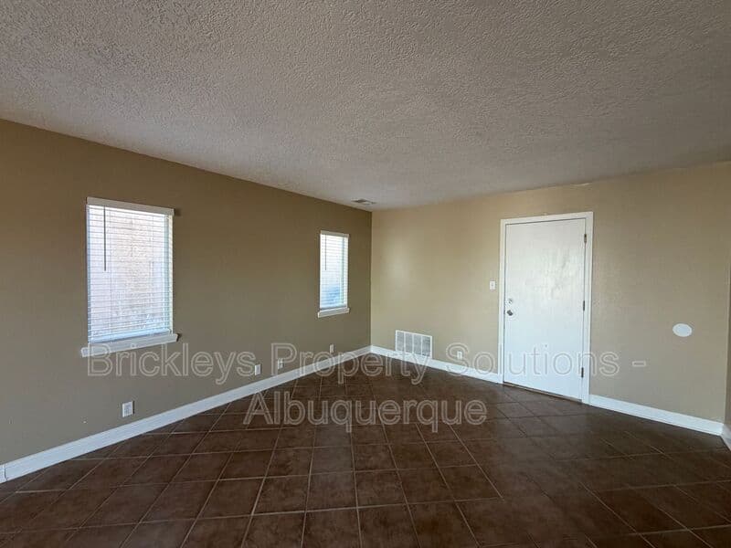 3-bedroom 2.5-bath home at 10527 Brookline Pl NW for $2,300/mo managed by Brickleys Property Solutions Albuquerque — photo 33 of 40