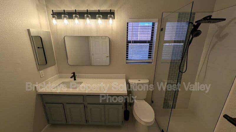 4-bedroom 3-bath home at 13354 W Palm Ln for $2,750/mo managed by Brickleys Property Solutions West Valley Phoenix — photo 6 of 31