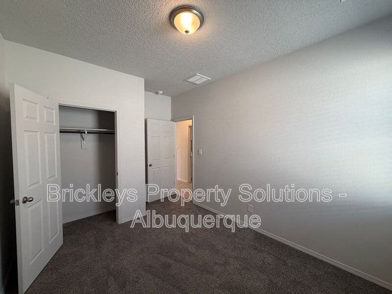 3-bedroom 2-bath home at 1504 Alto Colores for $2,100/mo managed by Brickleys Property Solutions Albuquerque — photo 22 of 30