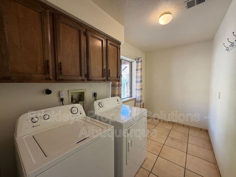 3-bedroom 2-bath home at 9937 Clearwater St. NW for $1,900/mo managed by Brickleys Property Solutions Albuquerque — photo 20 of 27