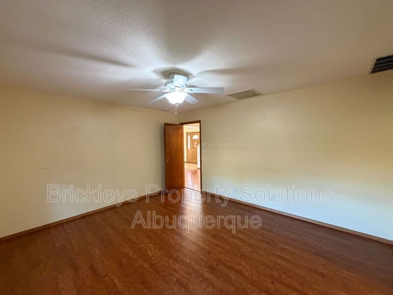 3-bedroom 2.5-bath home at 9600 Allande Rd NE for $3,200/mo managed by Brickleys Property Solutions Albuquerque — photo 28 of 40