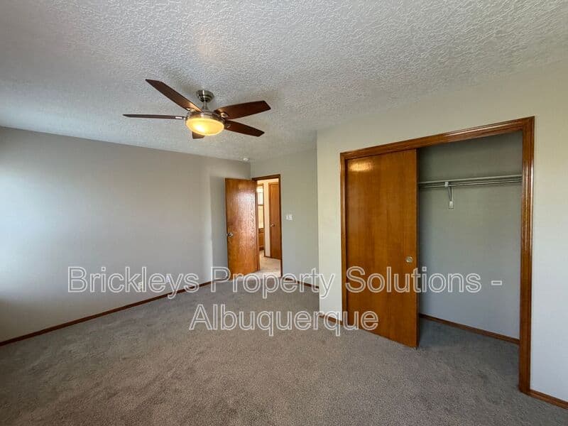 4-bedroom 2.5-bath home at 10331 Dunbar St NW for $2,300/mo managed by Brickleys Property Solutions Albuquerque — photo 13 of 43