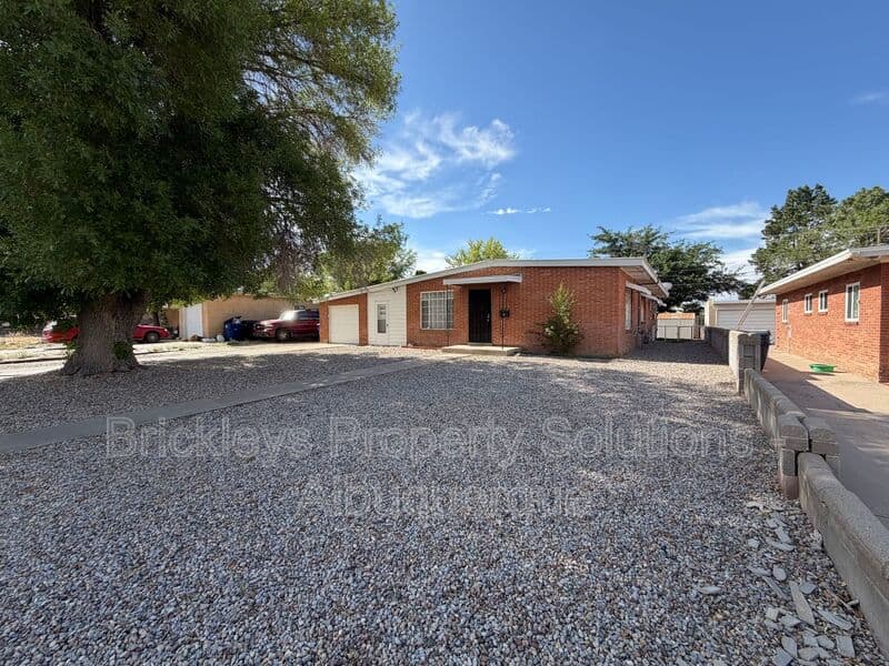3-bedroom 2-bath home at 4712 Palo Duro Ave. NE for $1,750/mo managed by Brickleys Property Solutions Albuquerque — photo 3 of 38