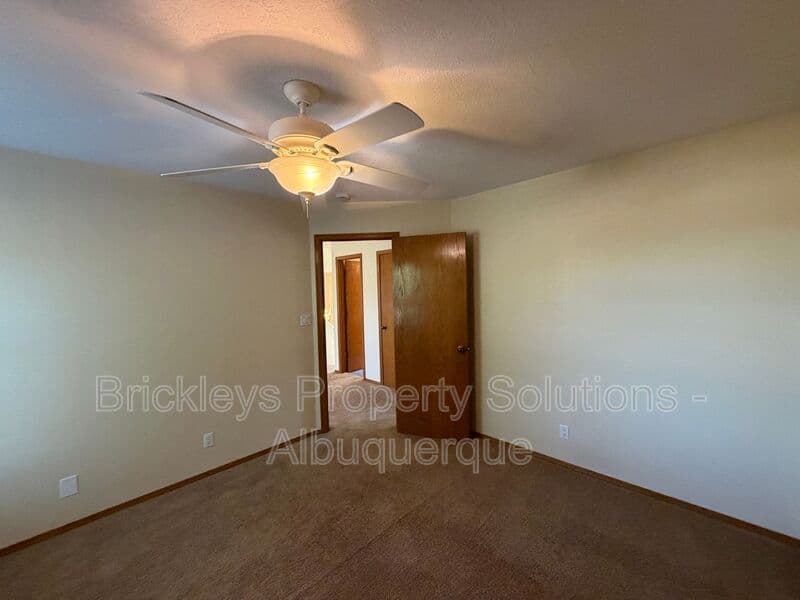 3-bedroom 2.5-bath home at 9600 Allande Rd NE for $3,200/mo managed by Brickleys Property Solutions Albuquerque — photo 9 of 40