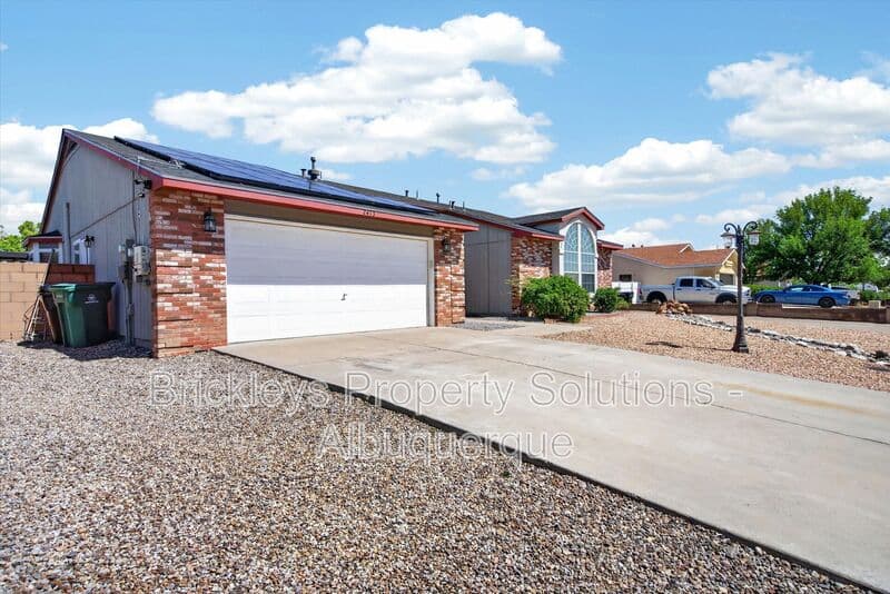 4-bedroom 2-bath home at 2413 Agua Fria Dr NE for $2,275/mo managed by Brickleys Property Solutions Albuquerque — photo 2 of 42