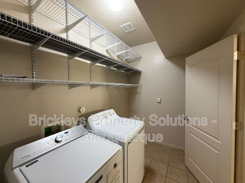 4-bedroom 3.5-bath home at 6228 Nacional Rd NW for $2,700/mo managed by Brickleys Property Solutions Albuquerque — photo 38 of 44