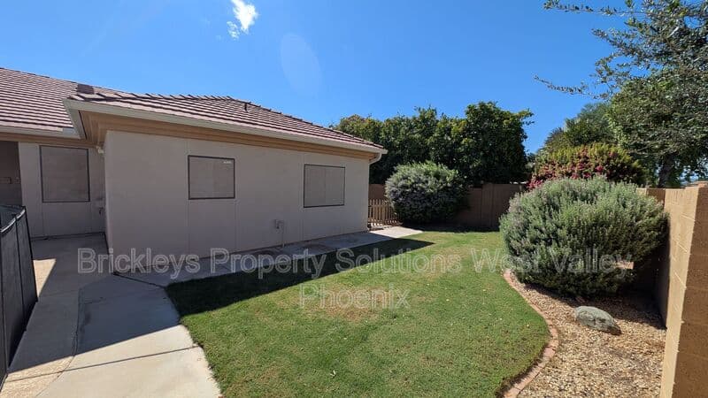 4-bedroom 3-bath home at 13354 W Palm Ln for $2,750/mo managed by Brickleys Property Solutions West Valley Phoenix — photo 3 of 31
