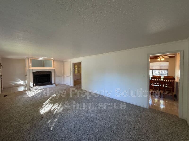 4-bedroom 3-bath home at 7121 Edwina Ave NE for $2,450/mo managed by Brickleys Property Solutions Albuquerque — photo 9 of 47
