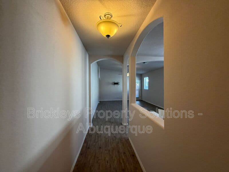 3-bedroom 2-bath home at 5815 Mafraq Ave NW for $2,150/mo managed by Brickleys Property Solutions Albuquerque — photo 5 of 32