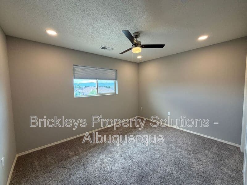 4-bedroom 3-bath home at 860 Fire Wheel Loop for $2,300/mo managed by Brickleys Property Solutions Albuquerque — photo 11 of 40