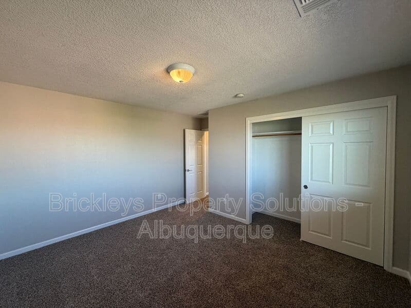 3-bedroom 2.5-bath home at 418 Paseo Roja Pl NE for $2,375/mo managed by Brickleys Property Solutions Albuquerque — photo 15 of 42
