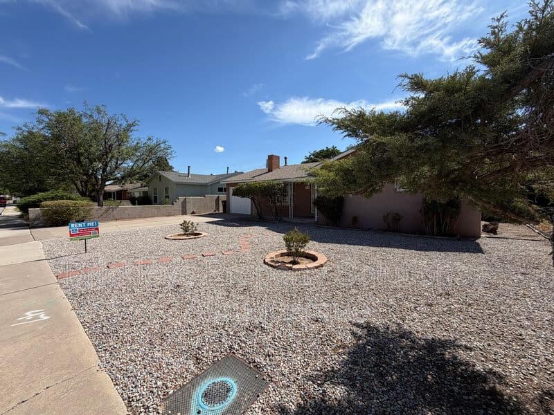 3-bedroom 1-bath home at 2838 La Veta Dr. NE for $1,700/mo managed by Brickleys Property Solutions Albuquerque — photo 2 of 26