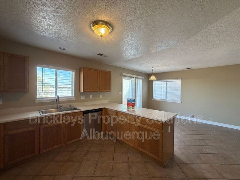 3-bedroom 2.5-bath home at 10527 Brookline Pl NW for $2,300/mo managed by Brickleys Property Solutions Albuquerque — photo 28 of 40