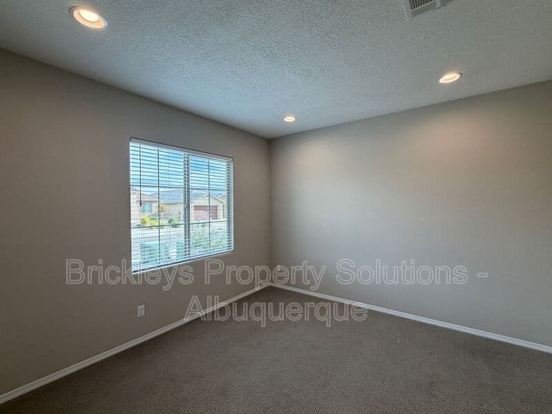 3-bedroom 2-bath home at 938 Lazuli Rd SE for $2,475/mo managed by Brickleys Property Solutions Albuquerque — photo 9 of 36