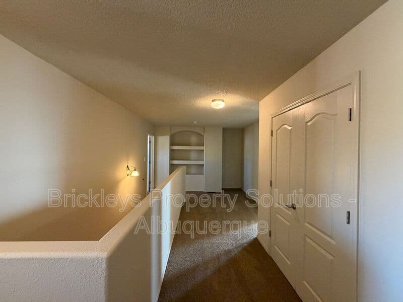 4-bedroom 3.5-bath home at 6228 Nacional Rd NW for $2,700/mo managed by Brickleys Property Solutions Albuquerque — photo 11 of 44
