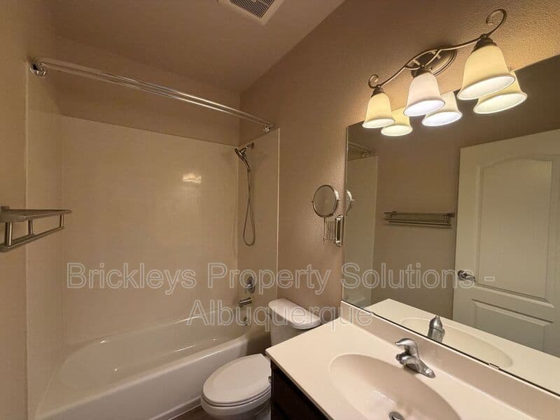 3-bedroom 2-bath home at 5815 Mafraq Ave NW for $2,150/mo managed by Brickleys Property Solutions Albuquerque — photo 14 of 32