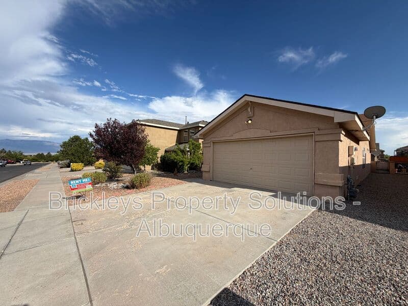 3-bedroom 2-bath home at 7704 Woodstar Ave NW for $1,825/mo managed by Brickleys Property Solutions Albuquerque — photo 2 of 28