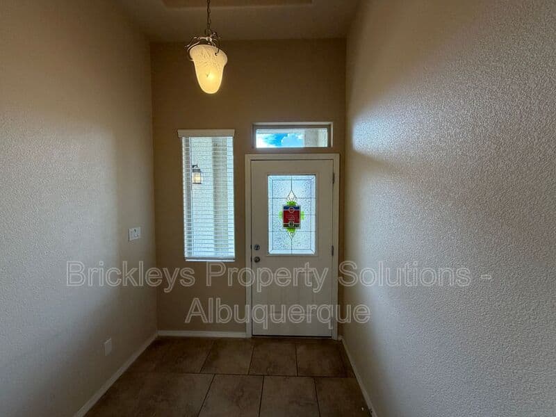 3-bedroom 2-bath home at 7304 Skagway Dr. NE for $2,200/mo managed by Brickleys Property Solutions Albuquerque — photo 4 of 36