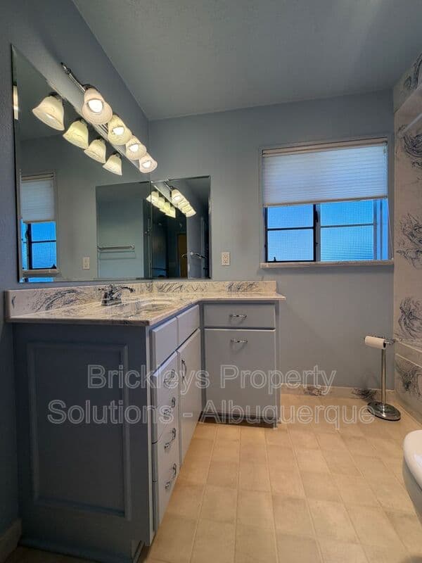 4-bedroom 3-bath home at 7121 Edwina Ave NE for $2,450/mo managed by Brickleys Property Solutions Albuquerque — photo 32 of 47