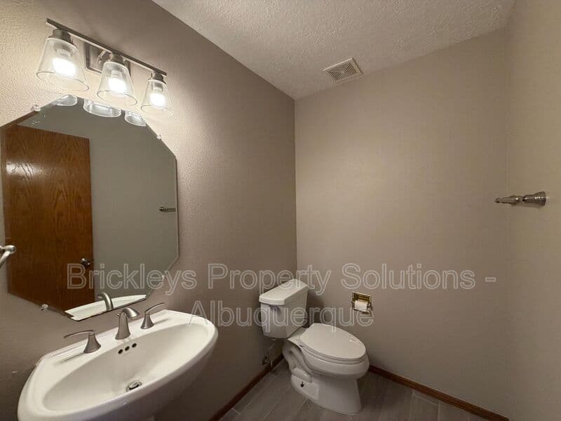 4-bedroom 2.5-bath home at 10331 Dunbar St NW for $2,300/mo managed by Brickleys Property Solutions Albuquerque — photo 28 of 43
