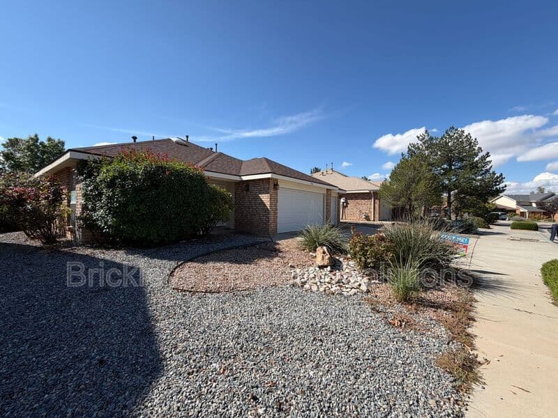 3-bedroom 2-bath home at 7024 Westford Pl NW for $2,200/mo managed by Brickleys Property Solutions Albuquerque — photo 2 of 33