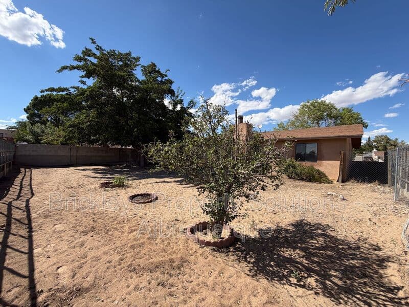 4-bedroom 2-bath home at 5812 Brahma Dr NW for $1,950/mo managed by Brickleys Property Solutions Albuquerque — photo 34 of 35