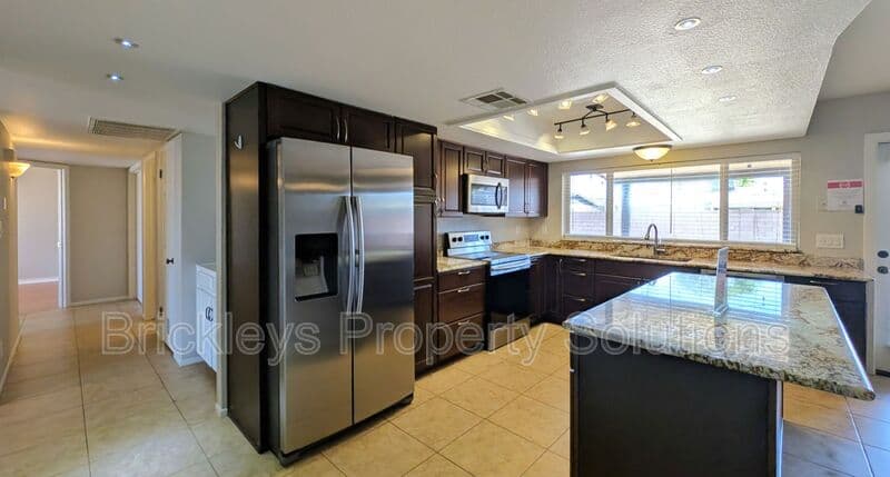 3-bedroom 2-bath home at 2431 W Plata Ave for $2,250/mo managed by Brickleys Property Solutions East Valley Phoenix — photo 11 of 43