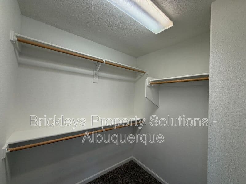 3-bedroom 2.5-bath home at 418 Paseo Roja Pl NE for $2,375/mo managed by Brickleys Property Solutions Albuquerque — photo 24 of 42