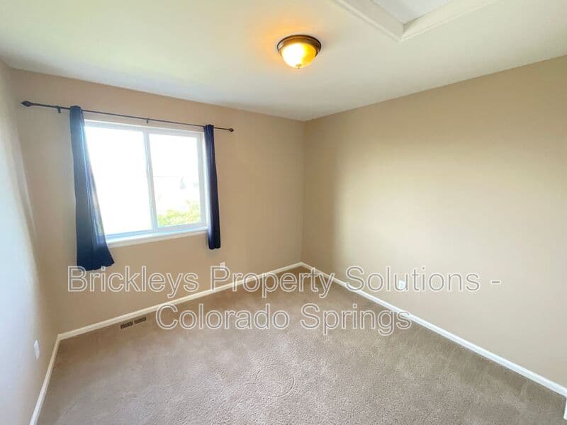 4-bedroom 2.5-bath home at 6652 Maple Stone Ln for $2,600/mo managed by Brickleys Property Solutions Colorado Springs — photo 36 of 43