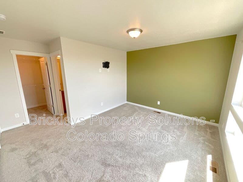 3-bedroom 3.5-bath home at 7343 Rosa Belle Hts for $2,350/mo managed by Brickleys Property Solutions Colorado Springs — photo 18 of 33