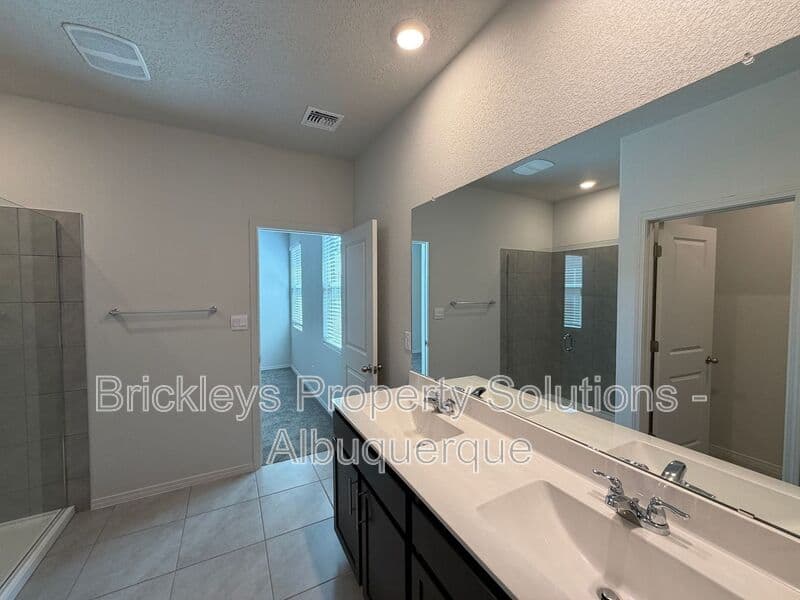 3-bedroom 3-bath home at 6118 Chicago Dr SE for $2,350/mo managed by Brickleys Property Solutions Albuquerque — photo 31 of 42
