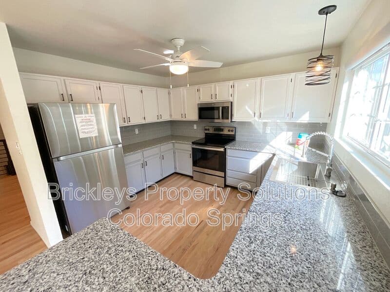 2-bedroom 1.5-bath home at 1857 Lorraine St for $1,800/mo managed by Brickleys Property Solutions Colorado Springs — photo 12 of 29