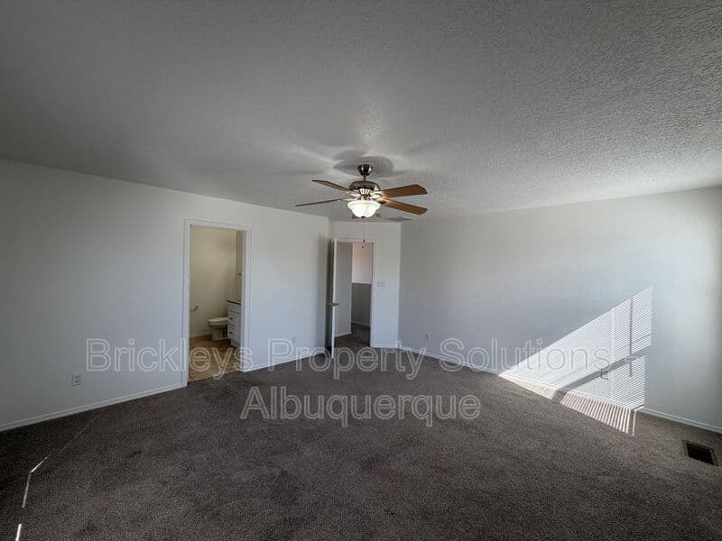 4-bedroom 3-bath home at 6027 Park South Pl NW for $2,400/mo managed by Brickleys Property Solutions Albuquerque — photo 20 of 36