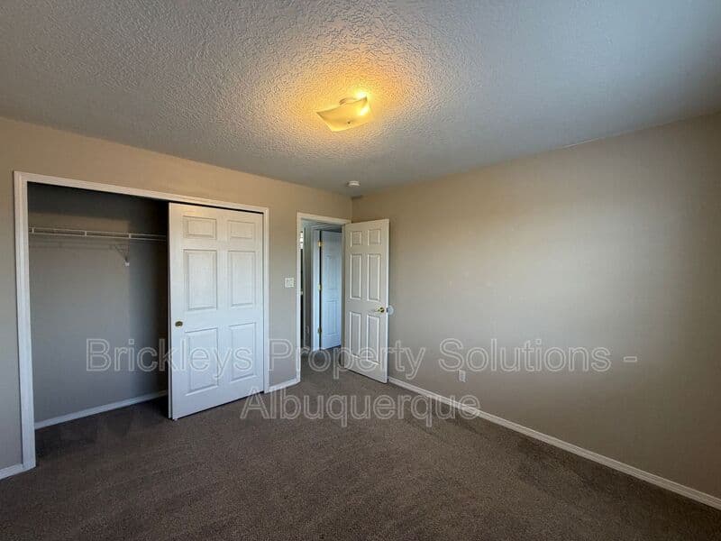 5-bedroom 4.5-bath home at 7008 Tree Line Ave NW for $2,500/mo managed by Brickleys Property Solutions Albuquerque — photo 21 of 43