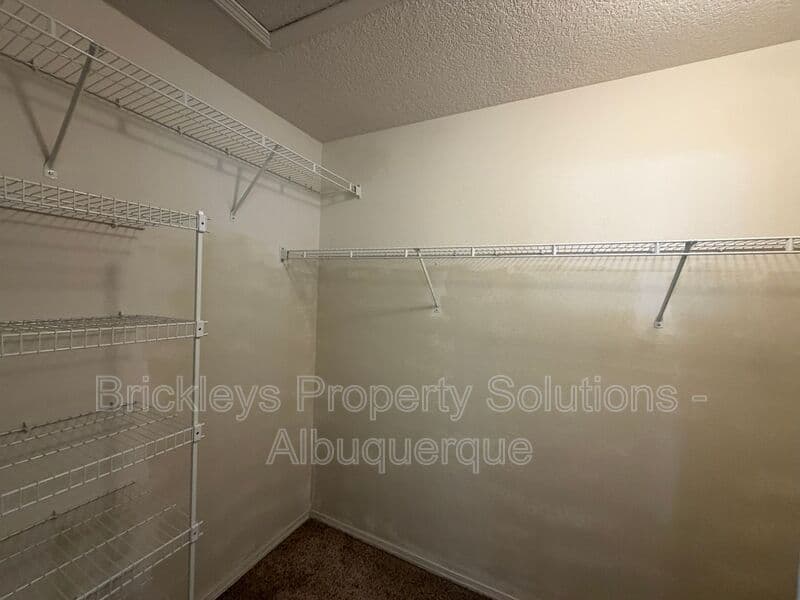 3-bedroom 3-bath home at 5004 Blue Stone Rd NW for $2,250/mo managed by Brickleys Property Solutions Albuquerque — photo 24 of 37