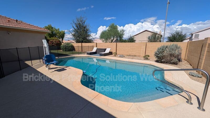 4-bedroom 3-bath home at 13354 W Palm Ln for $2,750/mo managed by Brickleys Property Solutions West Valley Phoenix — photo 2 of 31