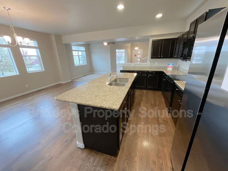 3-bedroom 2.5-bath home at 2401 Ellingwood Dr for $2,233/mo total (includes $2,195 base rent + $38 required Tenant Benefit Package) managed by Brickleys Property Solutions Colorado Springs — photo 16 of 40