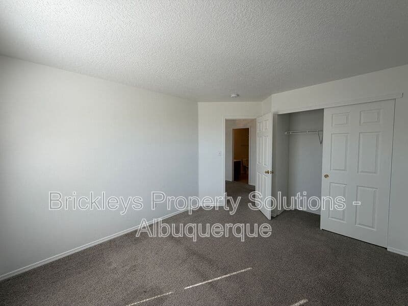 4-bedroom 3-bath home at 6027 Park South Pl NW for $2,400/mo managed by Brickleys Property Solutions Albuquerque — photo 33 of 36