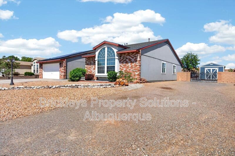4-bedroom 2-bath home at 2413 Agua Fria Dr NE for $2,275/mo managed by Brickleys Property Solutions Albuquerque — photo 3 of 42